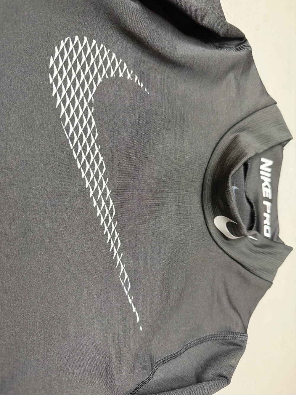 Kid’s Nike Pro Black Long Sleeve Compression Top. Size: Med